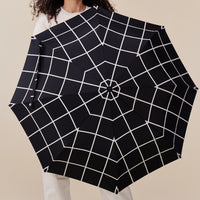 Grille noire | Parapluie canard